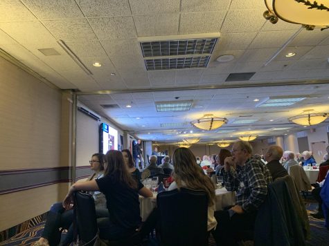 Seniors attended the National Security Forum breakfast to learn about COVID-19 and its predicted effects.