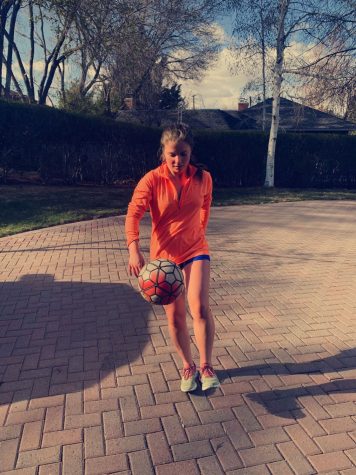 Means practices her soccer skills during quarantine to keep up her skills despite not physically being with her team.